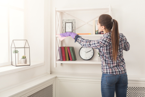Girl Cleaning dresser